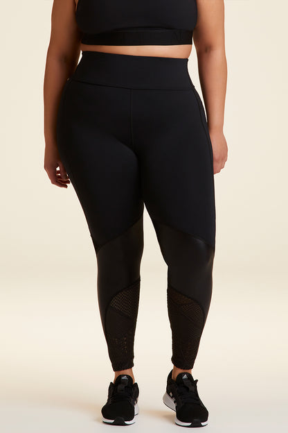 Front view of Alala Luxury Women's Athleisure collage tight in black