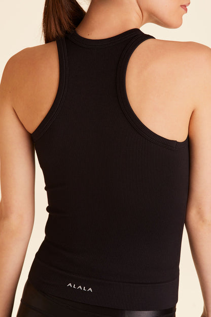 Back view of Alala Women's Luxury Athleisure seamless rib tank in black