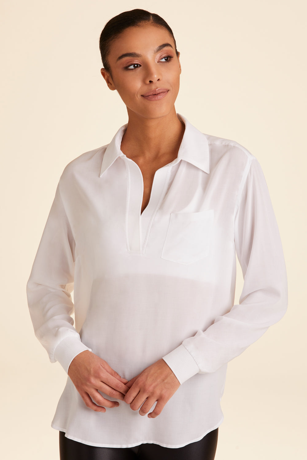 Front view of Alala Women's Luxury Athleisure lightweight woven pullover shirt in white
