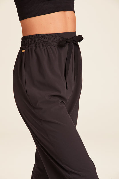 Zoomed view of Alala Luxury Women's Athleisure commuter pant in black