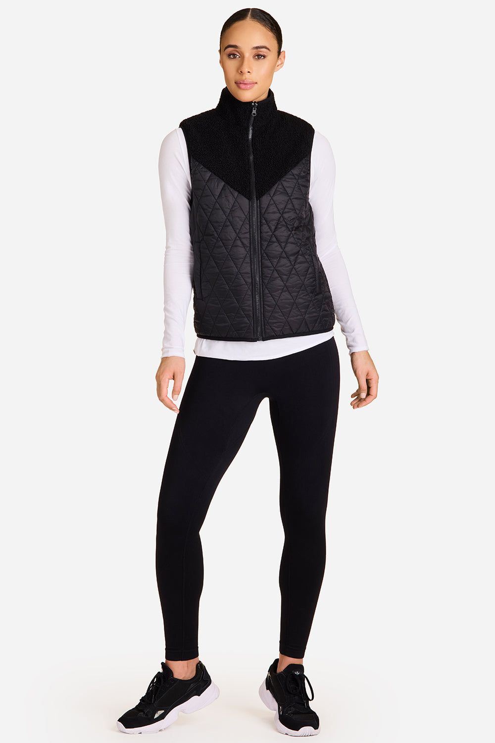 Alala reversible ski vest in black