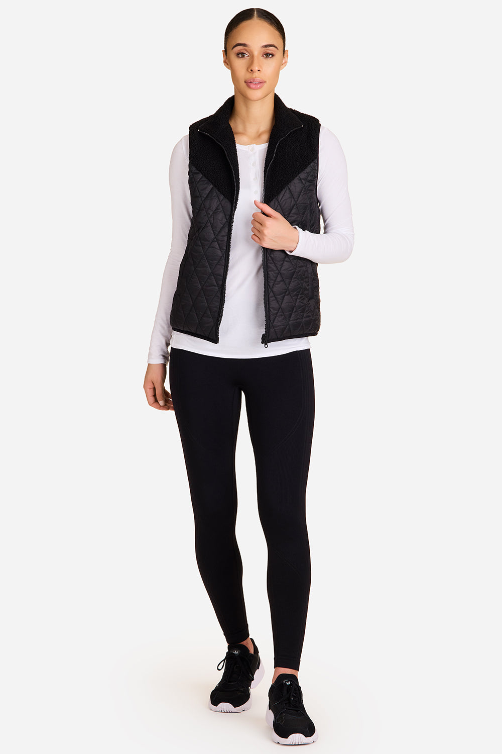 Alala reversible ski vest in black