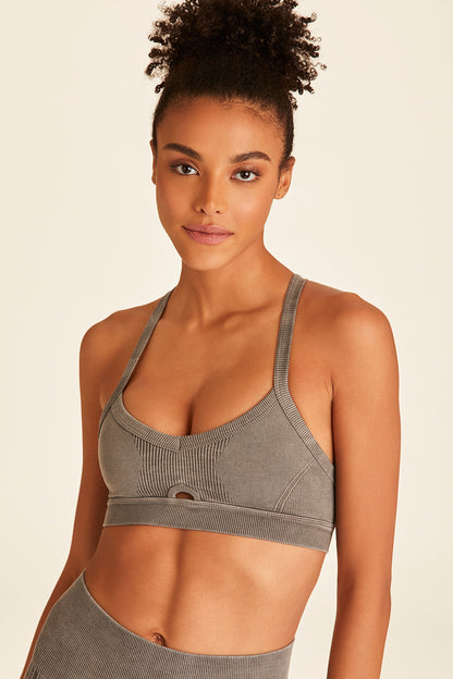 Mid view of woman posing casually wearing grey Barre Cami Bra