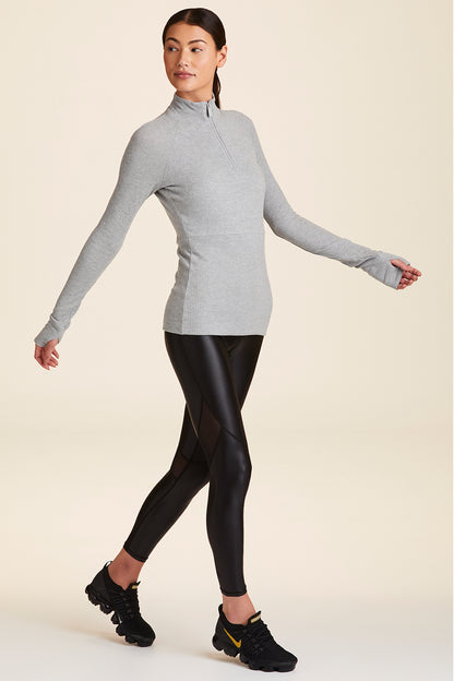 Front view of Alala Women's Luxury Athleisure super=soft quarter zip pullover