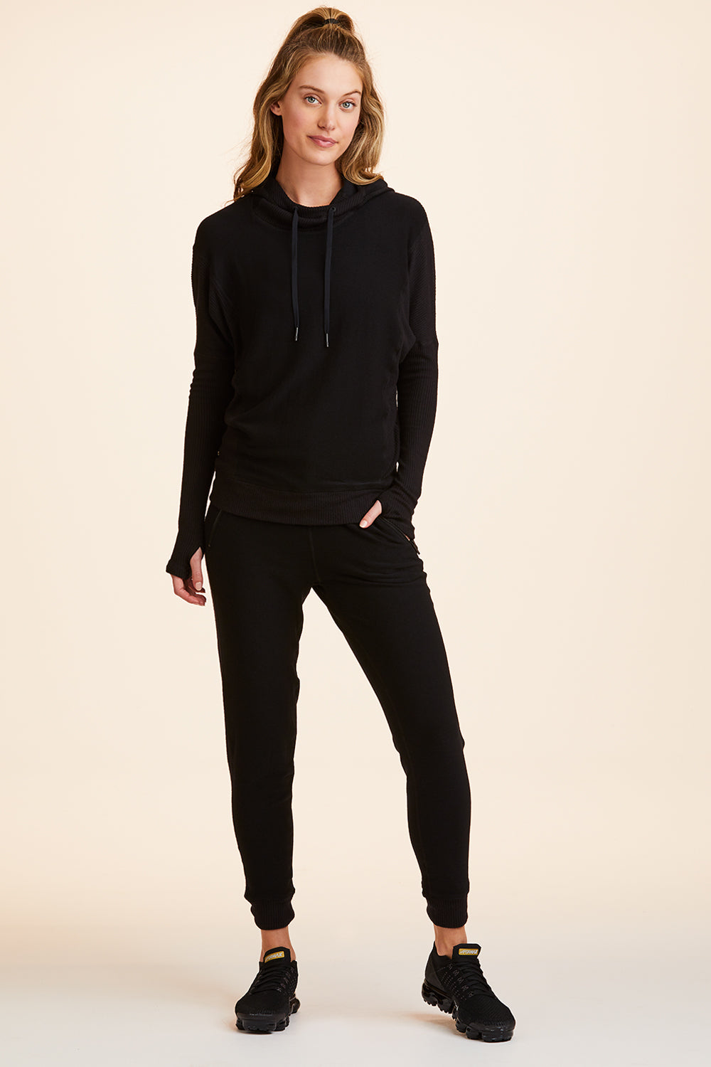Front view of Alala Women's Luxury Athleisure black hoodie