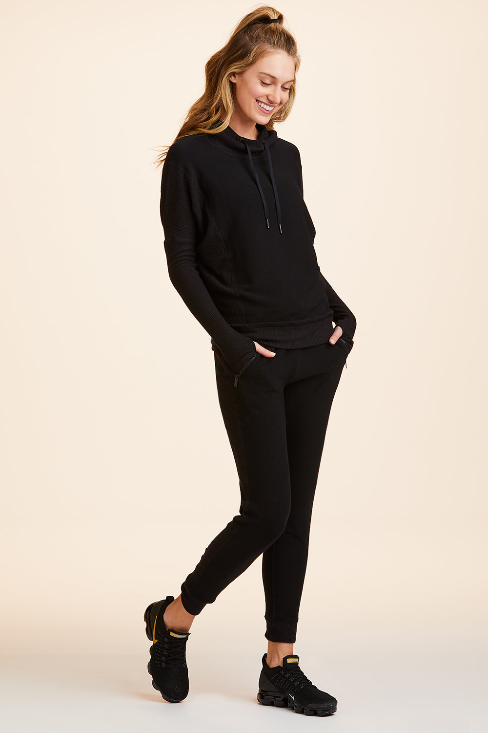 Front view of Alala Women's Luxury Athleisure black sweatpant