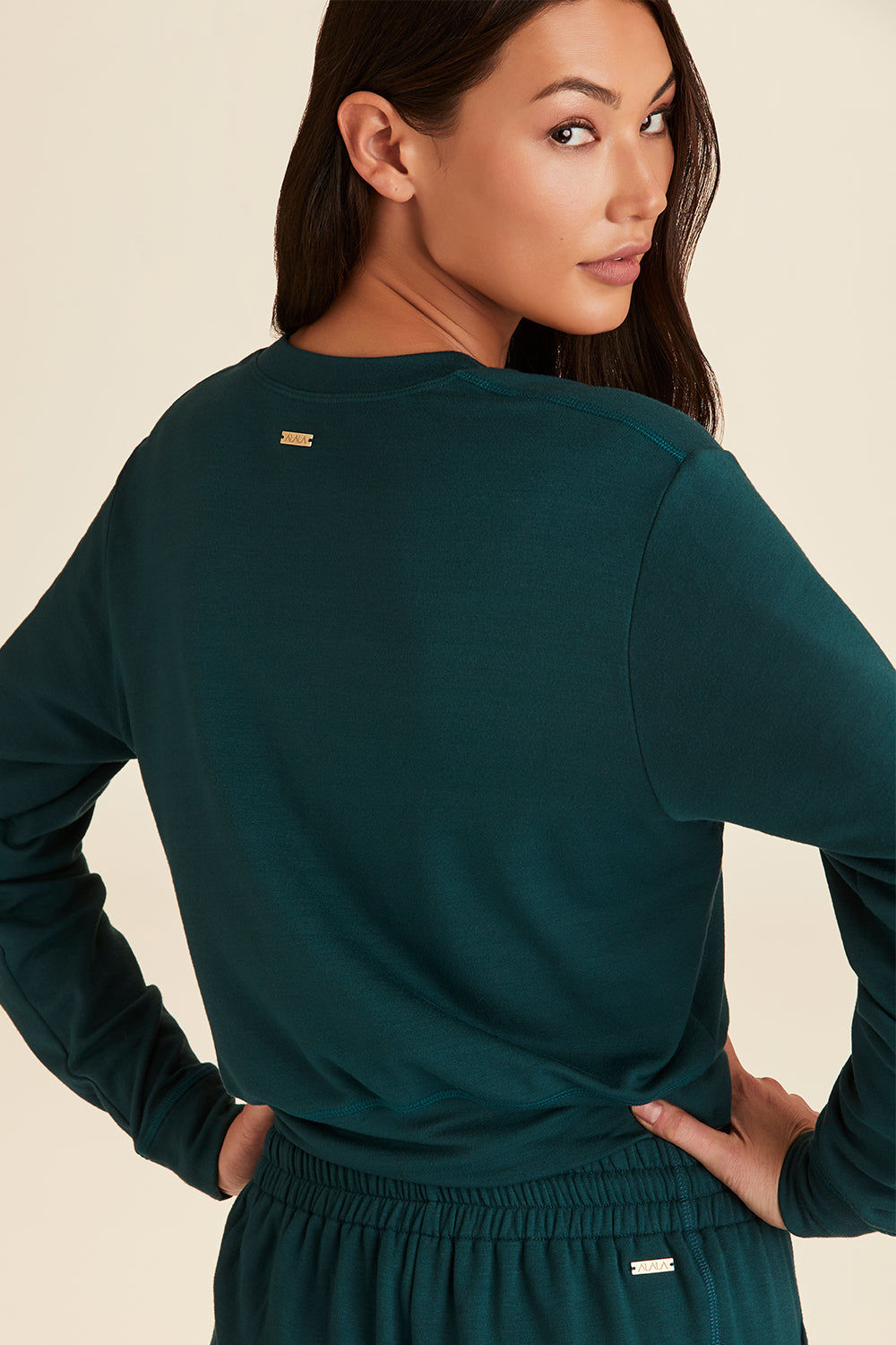 Alala women's quarter zip sweatshirt in dark green