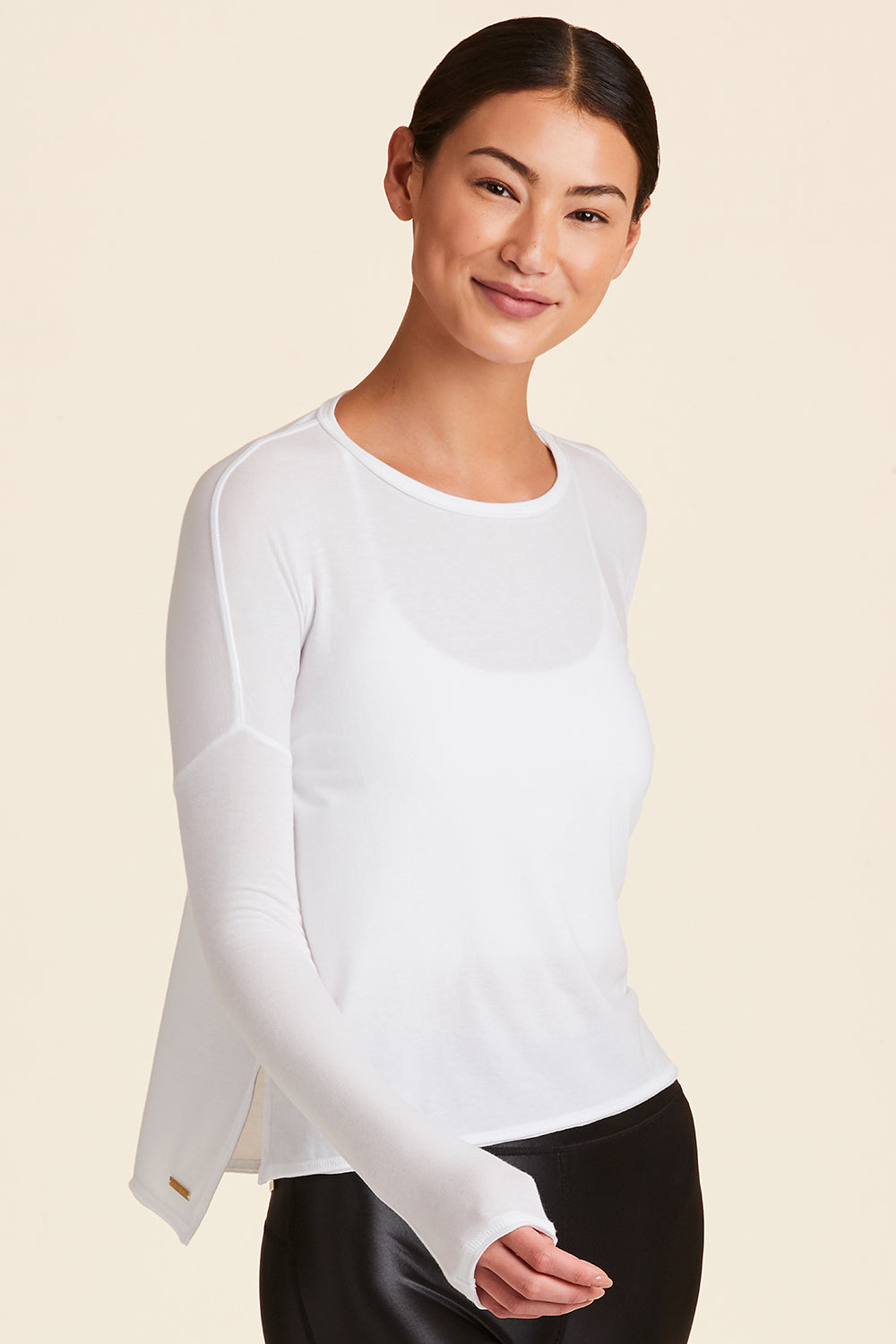 Front view of Alala Women's Luxury Athleisure white long-sleeve super soft tee
