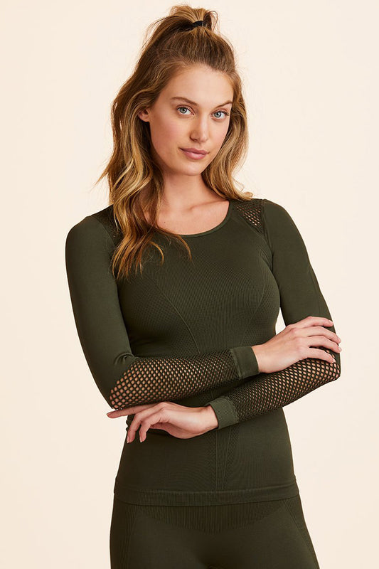 Front view of Alala Women's Luxury Athleisure army green seamless long sleeve tee with mesh detailing