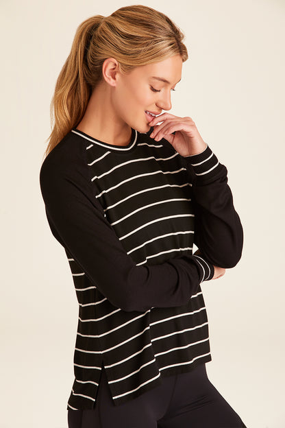 Front view of Alala Luxury Women's Athleisure breeze sweatshirt in black and white