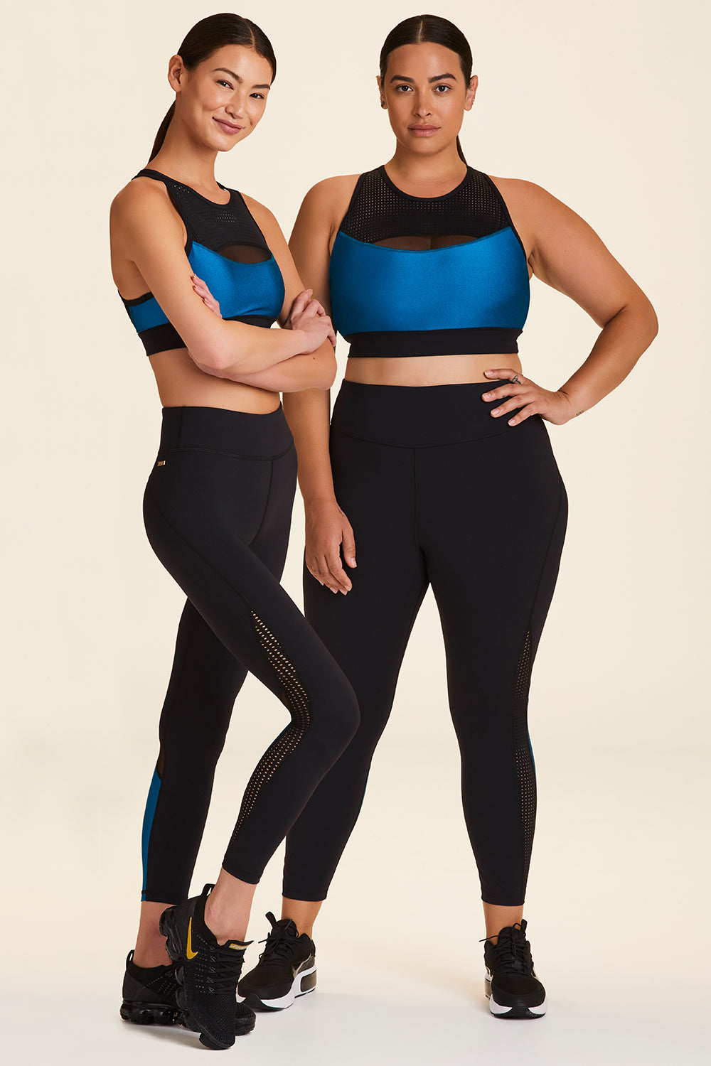 Side and front view of Alala Women's Luxury Athleisure black and teal 7/8 tight with minimal mesh detail