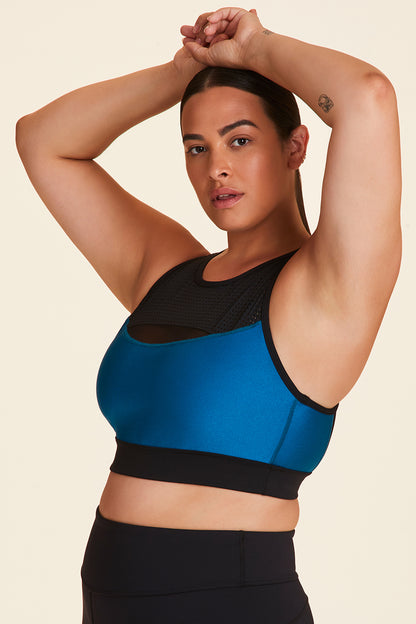 Front view of Alala Women's Luxury Athleisure black and teal sports bra with mesh detail in plus size