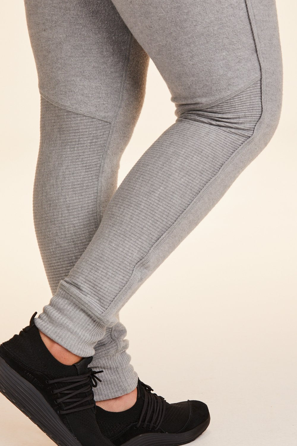 Side view close-up of Alala Women's Luxury Athleisure super-soft grey sweatpant