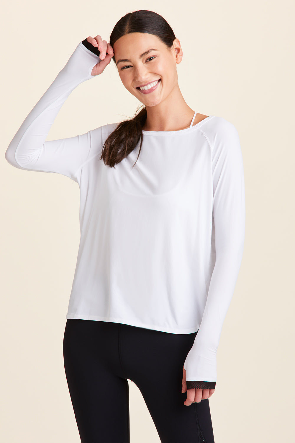 Front view of Alala Women's Luxury Athleisure white long sleeve tee
