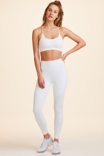 Front view of Alala Women's Luxury Athleisure white tight with rib detail