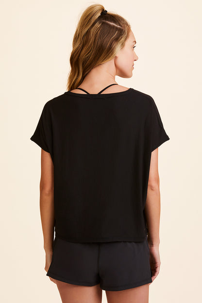 Back view of Alala Women's Luxury Athleisure super-soft tee in solid Black