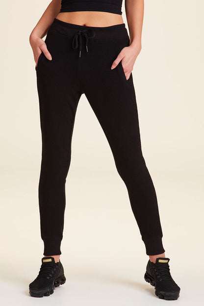 Front view of Alala Women's Luxury Athleisure wander sweatpant in black